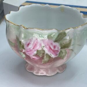 Antique Limoges France porcelain footed bowl pink floral design. Gold trim.